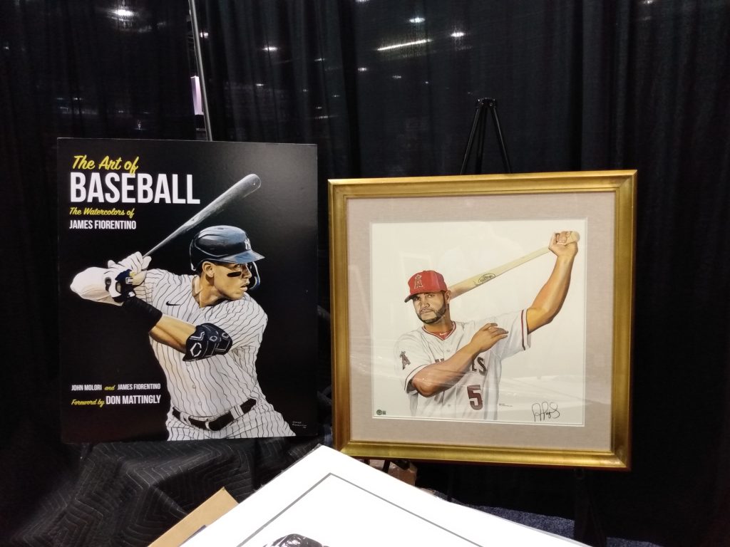 The Art of Baseball: The Watercolors of James Fiorentino by John Molari and James Fiorentino and a watercolor painting of Albert Pujols.